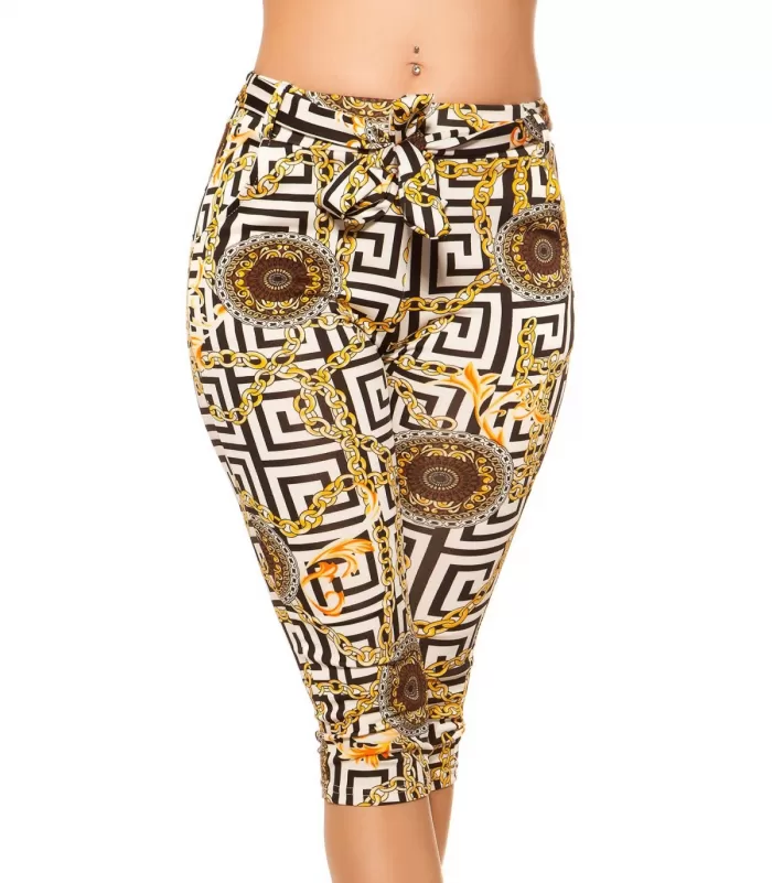 Ketjuprinttikuvioiset capritreggingsit vyöllä