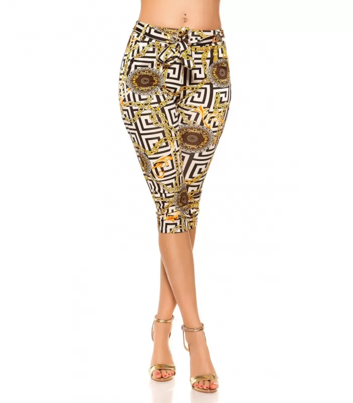 Ketjuprinttikuvioiset capritreggingsit vyöllä