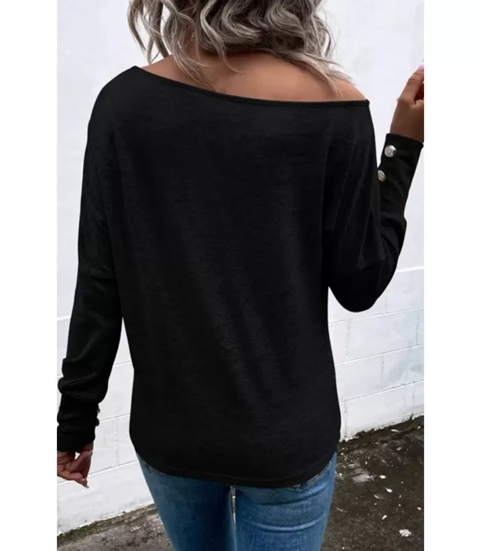 Musta pitkähihainen paita napeilla ja olkahalkioilla