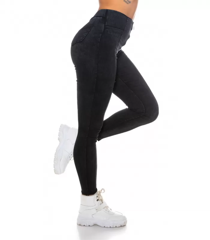 Mustat takataskulliset jeggingsit vetoketjulla