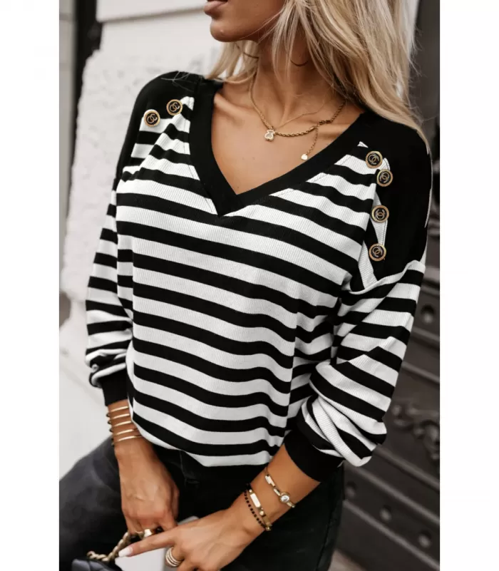 Pitkähihainen mustavalkoinen raitapaita koristeilla