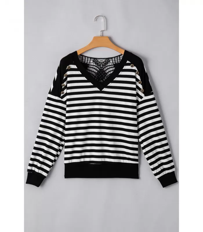 Pitkähihainen mustavalkoinen raitapaita koristeilla