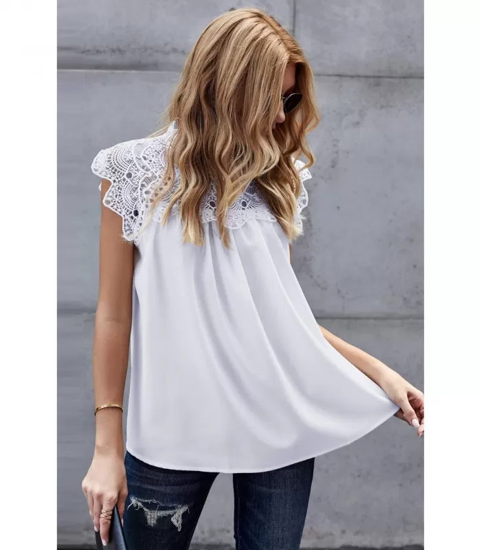 Valkoinen koristekirjailtu väljä toppi