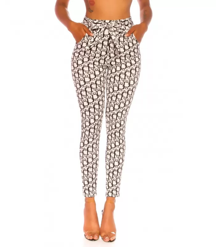 Valkomustat printtikuvioiset treggingsit vyöllä