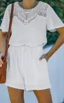 Valkoinen_lyhythihainen_koristekirjailtu_playsuitLC643998_1.jpg